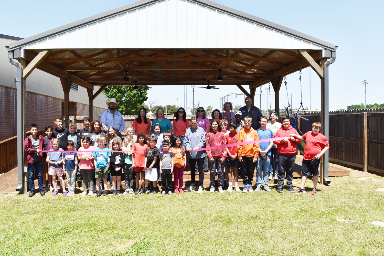 Mineola Middle and Primary School students helped dedicate their outdoor learning room between the two campuses.